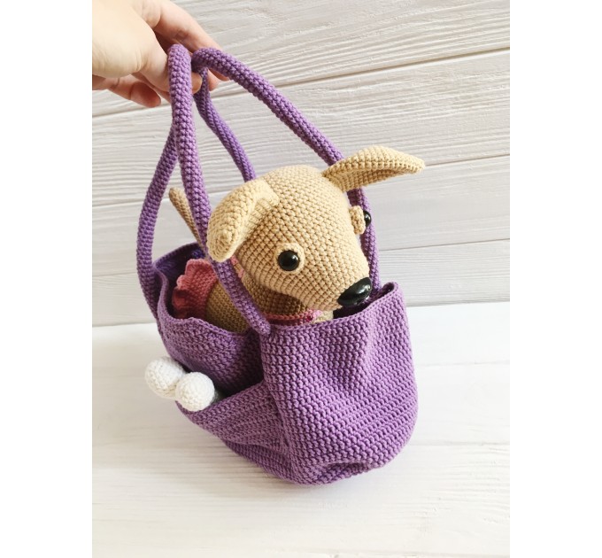 Stuffed Chihuahua dog in a bag