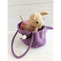 Stuffed Chihuahua dog in a bag