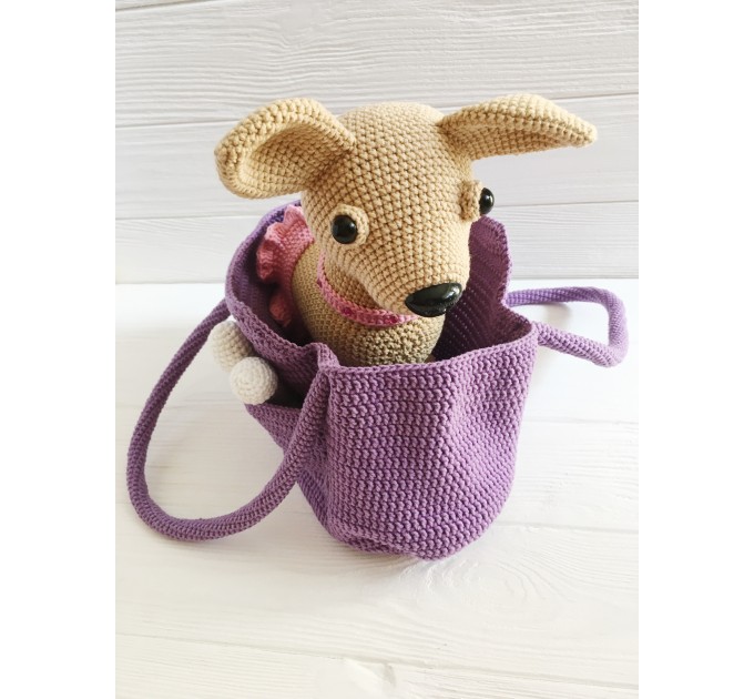 Stuffed Chihuahua dog in a bag
