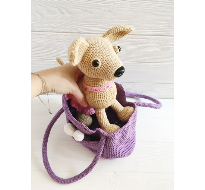 Stuffed Chihuahua dog in a bag