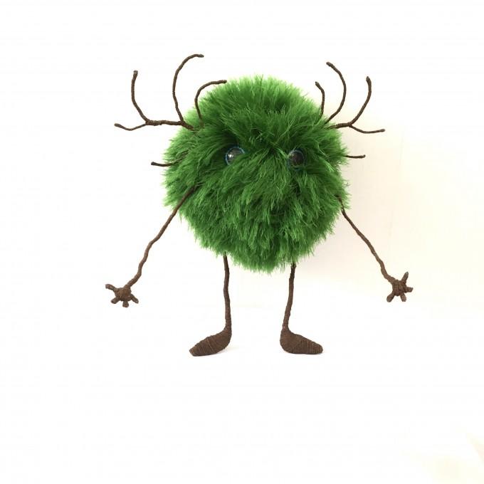 green fluffy monster plush