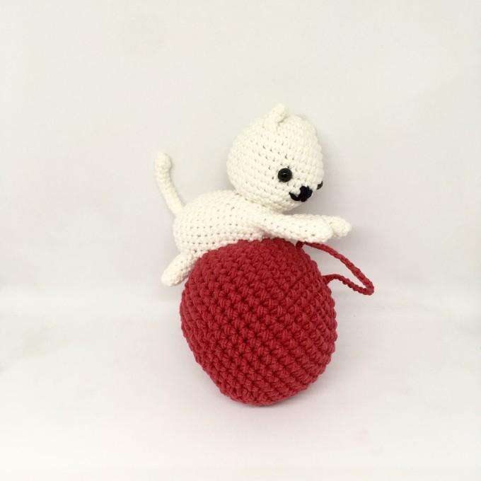 stuffed cat on ball