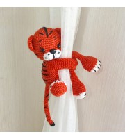 Tiger curtain tieback