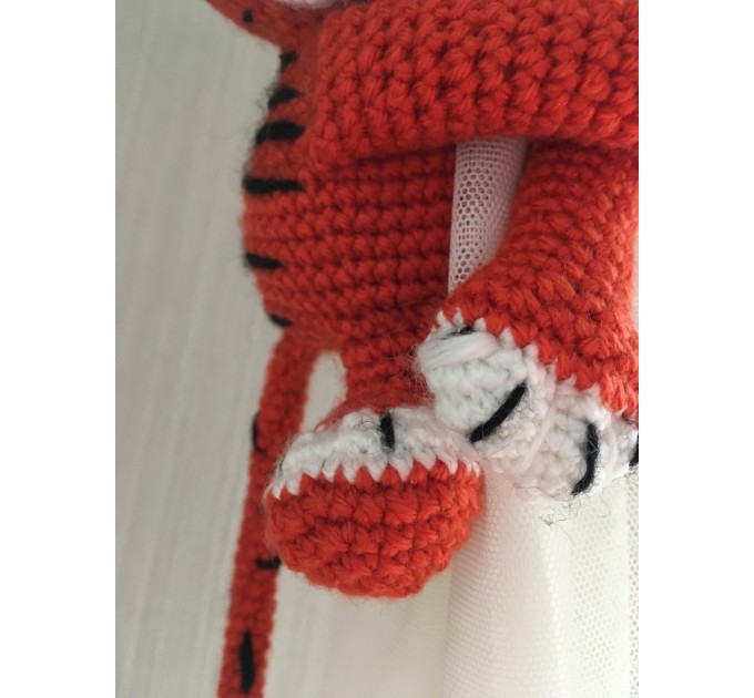 Tiger curtain tieback