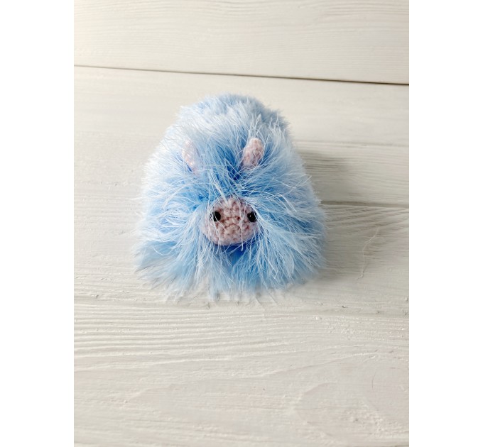 Amigurumi blue and pink caterpillar