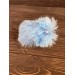 fluffy blue and pink caterpillar