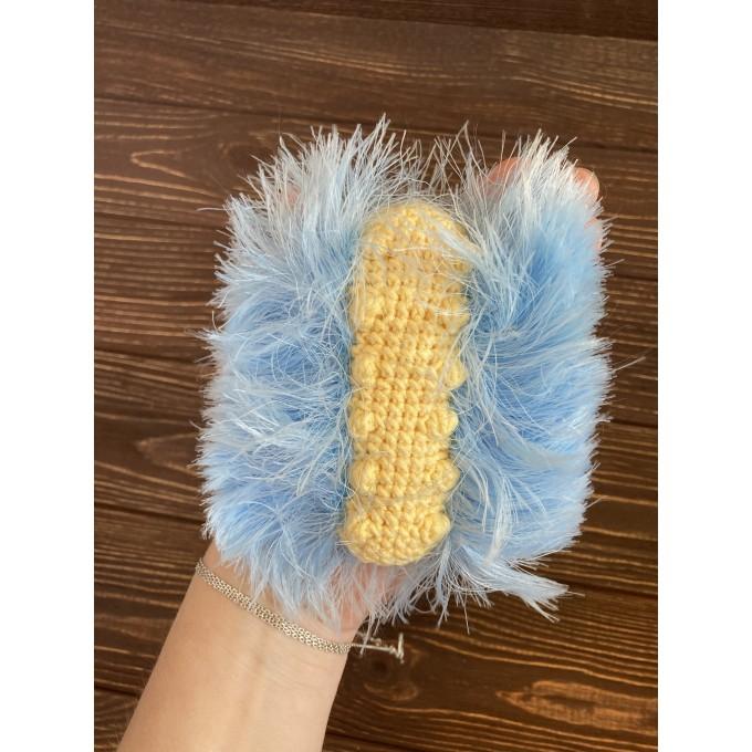 stuffed yellow and blue caterpillar