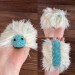 white and mint caterpillar toy