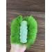 fluffy green caterpillar charm