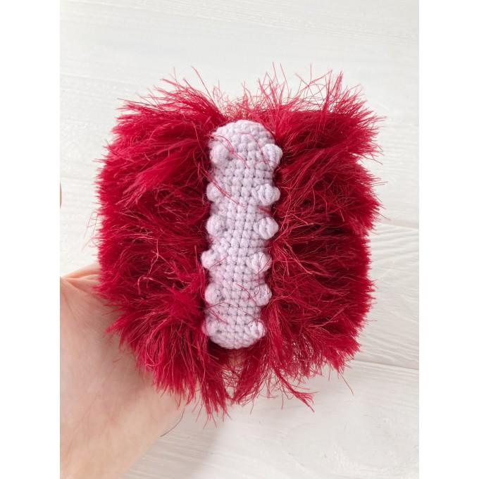 red and pink caterpillar plush