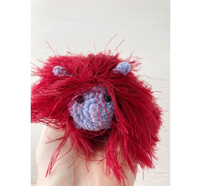 Amigurumi red and purple caterpillar