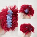 Amigurumi red and purple caterpillar