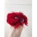 furry red and purple toy