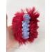 Amigurumi red and purple caterpillar
