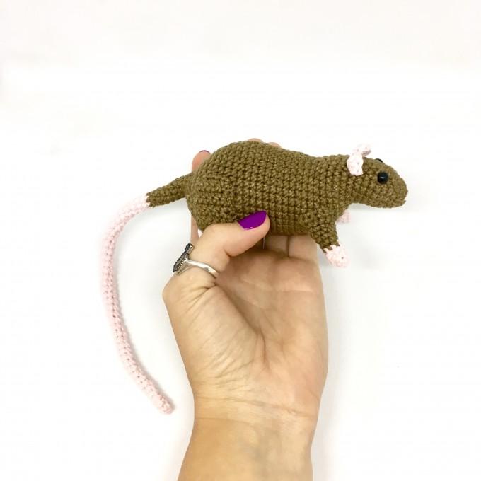 stuffed brown rat toy