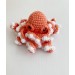 orange small stuffed octopus black