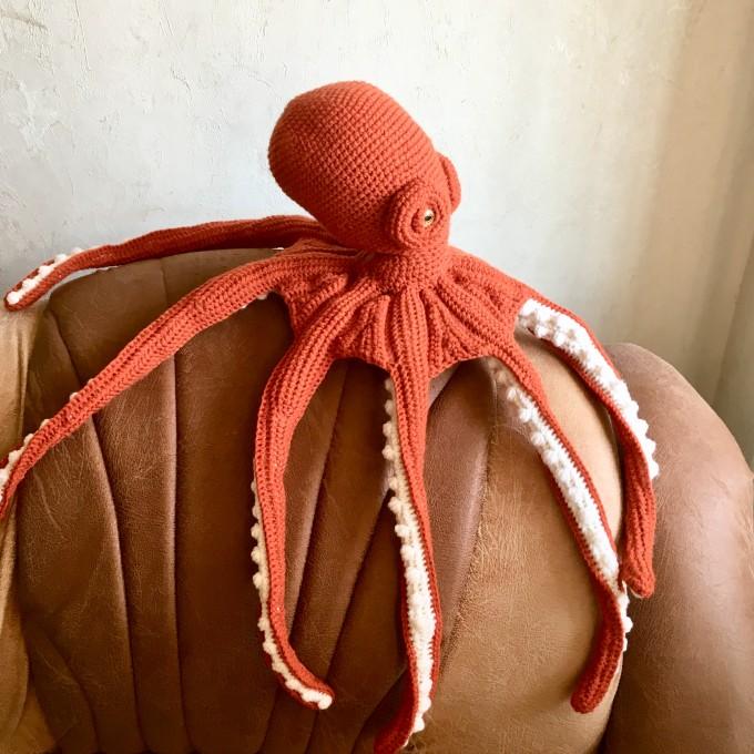 orange octopus on a sofa
