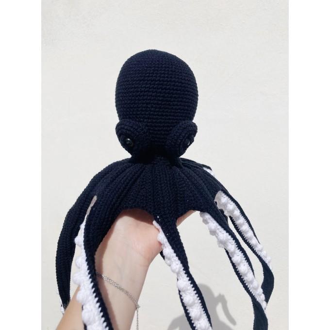 Black stuffed octopus