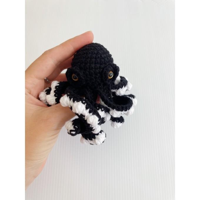 small black stuffed octopus