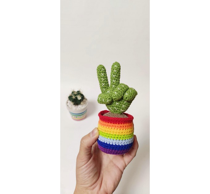 Cactus with victory fingers