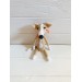 stuffed beige greyhound dog