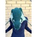 green reptile hat