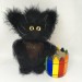 stuffed fluffy black cat