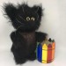 Stuffed black fluffy fat cat