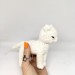 Stuffed white cat