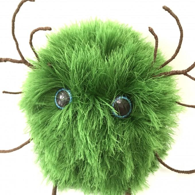 stuffed green fluffy monster