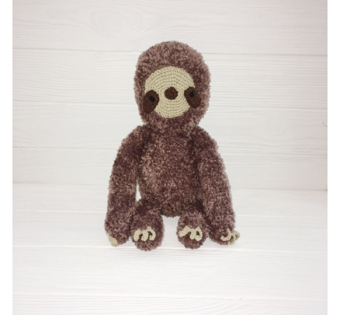 Stuffed sloth toy
