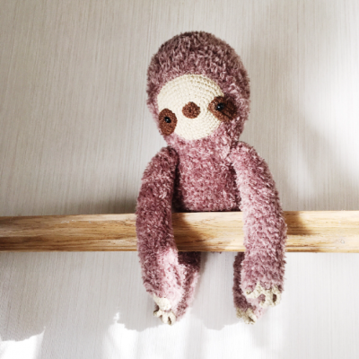 Stuffed sloth toy